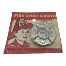 Listing image for Fire Chief Badge Toy Metal Pin Junior Fire Chief w/ Ladder, Ax & Hat New Sealed